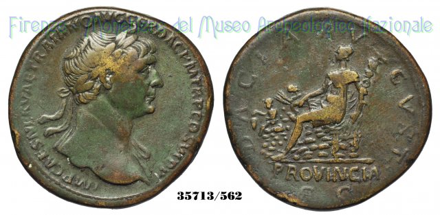 RIC 621 - Dacia con aquila legionaria, e due bambini con spighe e grappoli d’uva 112-117 d.C. (Roma)
